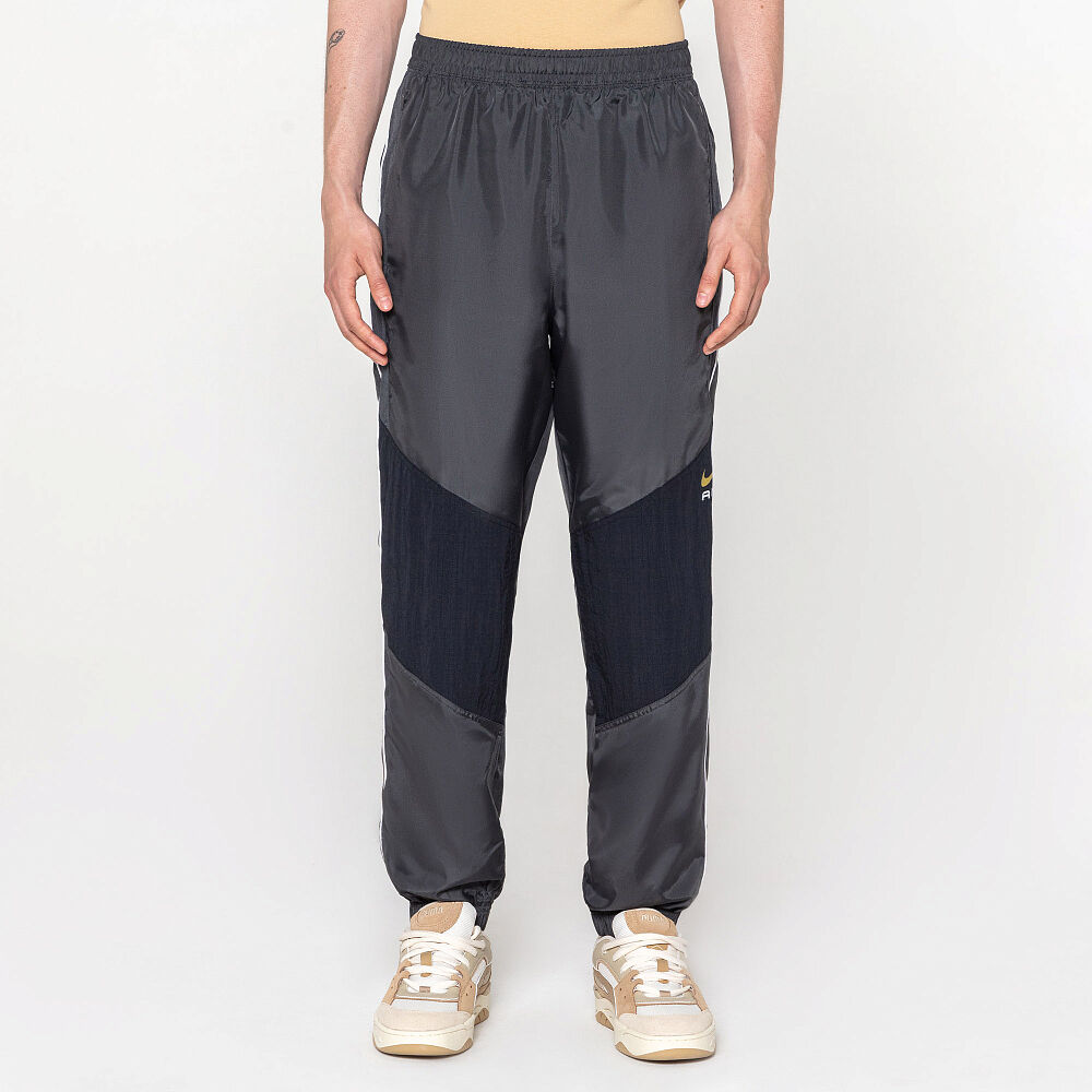 Мужские брюки Nike Air Woven Trousers FN7688-070-M фото 1